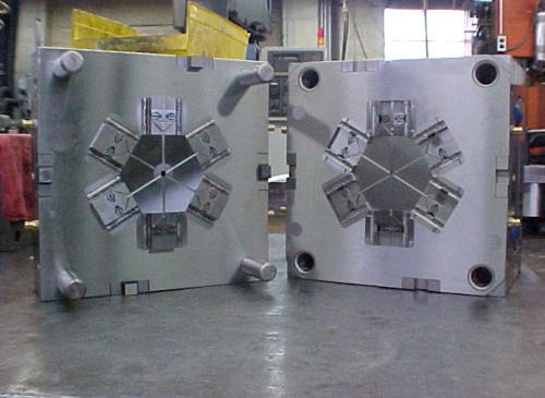 Cross-fitting mold with four-way slide action
