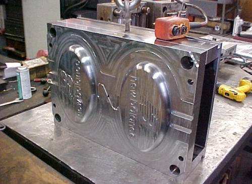 Finished mold with branded engraving inserts